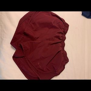 Red Nike shorts
